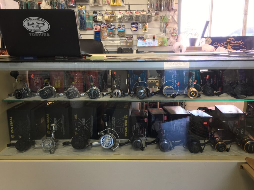 A glass counter with Toshiba laptop on top