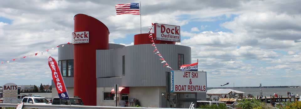 Dock store with jet ski rentals sign.