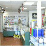 Interior of a small convenience store with various products.