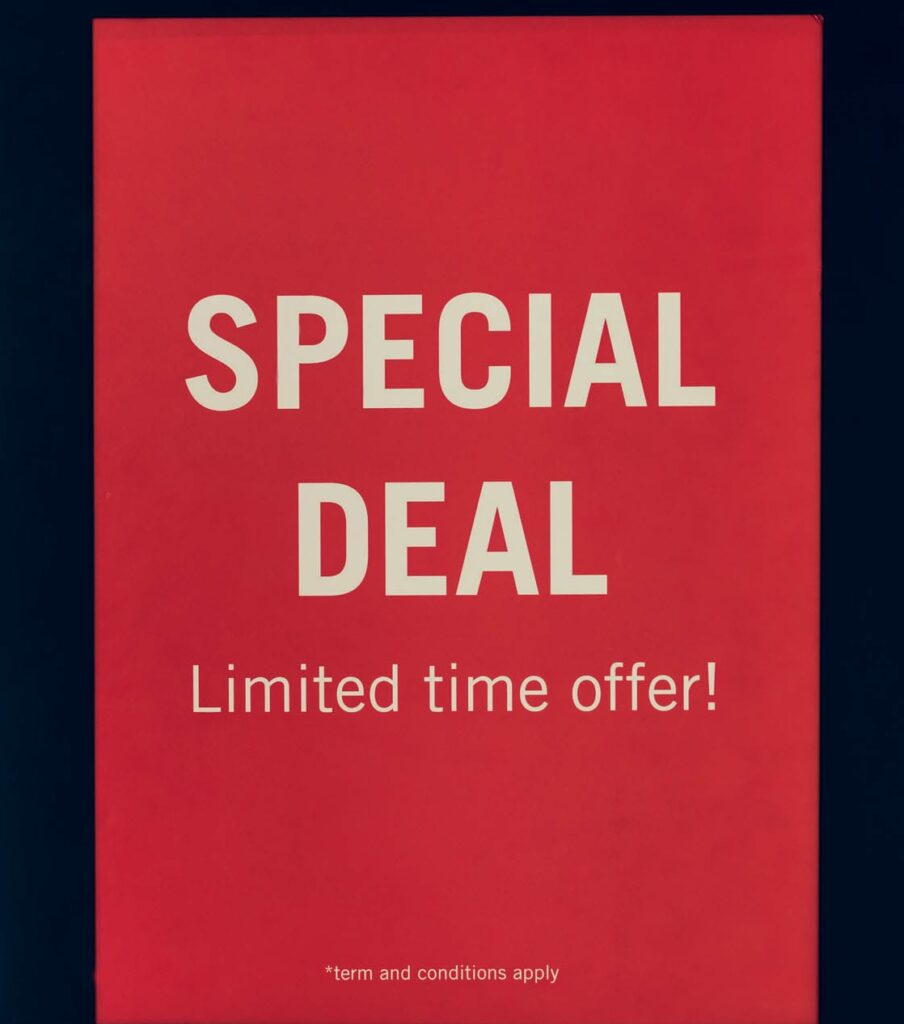Red sign advertising a limited-time special deal.
