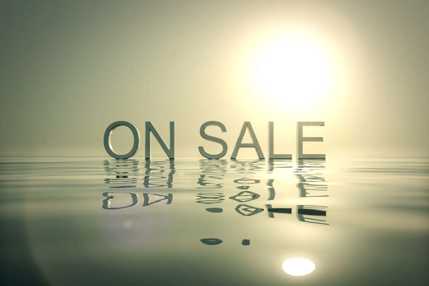 3D letters spelling 'ON SALE' reflected on calm water with bright sun.