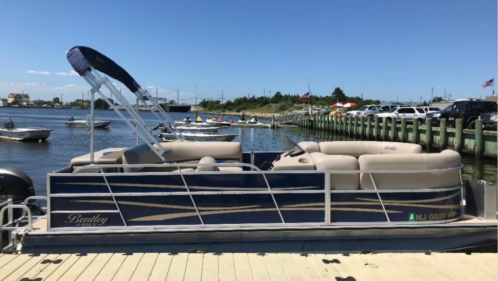 View of a marina with boats docked on a sunny day.