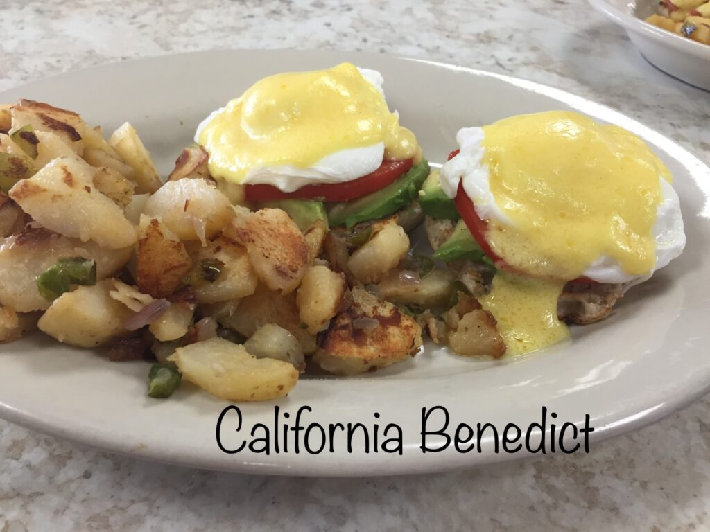California Benedict with poached eggs and potatoes.